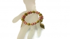 Bracelet en perles rondes roses et dorées. 
