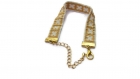 Il piccolo braccialetto dorato : bracelet doré et blanc en perles de rocailles 