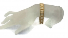 Il piccolo braccialetto dorato : bracelet doré et blanc en perles de rocailles 