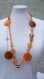 Sautoir orange en perles synthétiques 