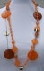 Sautoir orange en perles synthétiques 