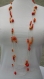 Sautoir orange en perles de bois montées sur fil coton 