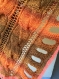 Poncho orange-marron tricote main 
