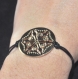 4982r / bijou bracelet alliage doré arabesque sur cordon cuir noir 