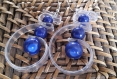 Boucles d'oreilles pendantes pvc transparent et perles magique bleue 