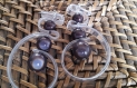 Boucles d'oreilles pendantes pvc transparent et perles magique noire 