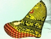 Chaussure en tissu wax(pagne africain) couleur verte, jaune et rouge 
