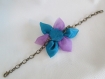 Bracelet avec une fleur d'organza et un coeur de perle, sur une chainette en bronze 