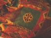N°159 -tissu en polyester viscose coton-rouille à motifs vert marron rouge - effet brillant - style afrique 