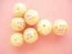 Assortiment de perles en pate polymere tons beige