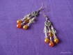 Boucles d'oreilles perles en verre et métal vieil or métal doré orange / bronze