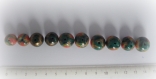 Assortiment de 10 perles en polymere fond vert