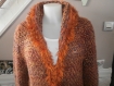 Veste réalisé au crochet dans une belle laine toute douce,un beau dégradé orangé et de fil poil de couleur 