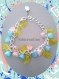 Bracelet breloques fleurs et feuilles pastel 