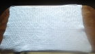 Petite couverture blanche pour bébé en coton tricote à la main 