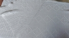 Petite couverture blanche pour bébé en coton tricote à la main 