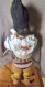 Une petite poupée bulgare traditionnelle-avec le "gaïta,gaïda,cornemuse" en cuillère de bois 