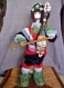Une petite poupée bulgare traditionnelle-avec la "gadoulka" en cuillère de bois 