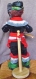 Une petite poupée bulgare traditionnelle-avec la "gadoulka" en cuillère de bois 