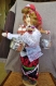 Une petite poupée bulgare traditionnelle- "la porteuse d'eau" en cuillère de bois 