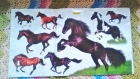Lot de 8 d'autocollants chevaux mural sur un planche 