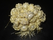 Perle boutons aakads réalisés à partir de fil doré 