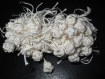 Perle boutons aakads réalisés à partir de fil de soie végétale blanc 