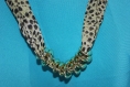 Collier en tissu léopard avec ses perles 
