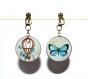 Boucles d’oreilles clips bronze avec cabochons synthétiques * montgolfière et papillons * 