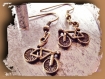 Boucles d'oreilles à pendants vélo pour cycliste en métal aspect bronze 
