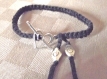 Bracelet mixte noir fermoir coeur argenté cordon coton 