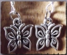 Boucles d'oreilles à pendants papillon en métal argenté 