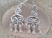 Boucles d'oreilles celtique triskel en métal argenté 