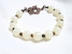 Bracelet en perles de verre ivoire fleur cuivre 