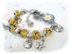 Montre jaune en perles de verre et metal argenté -ajustable m25 