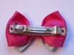 Barrette métal 5 cm avec noeud papillon en tissu rose et bleu à gros pois noirs 