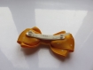 Barette plastique 4 cm avec noeud papillon en tissu satin imprimé jaune à petits pois blancs 