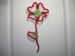 Fleur en tricotin et fil de fer pour chambre d'enfant ! 