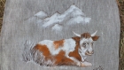 Set de table piece unique peinture vache couchée sur un decor de montagne 