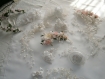 Cascade de fleurs et de perles blanche-écrue pour mariage 