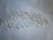 Cascade de fleurs et de perles blanche-écrue pour mariage 