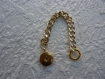 Bracelet chaine de couleur doré avec une plate forme 