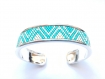 Très joli bracelet bleu et argent tissé en perles miyuki monté sur bracelet rigide 