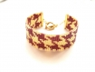 Très joli bracelet bordeaux et doré tissé en perles miyuki 