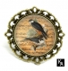 Bague bronze antique ronde motif vol de rapaces 