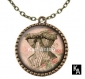 Collier couleur bronze avec pendentif rond + chaine motif bustier sur fond de roses ( 1345 ) - mode, fashion, 