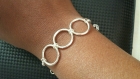 Bracelet tendance argenté avec 3 anneaux 
