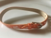 Bracelet en simili cuir orange motif papillon 22cm 
