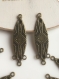 Pendentifs stylisés ovales bronze avec piquots x2 