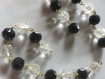 Perles facettées transparentes et noires sur chaîne bronze 
